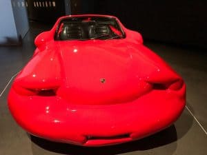 Mona melted red Porsche